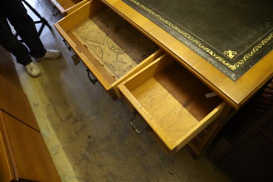 A reproduction yew pedestal desk, W.120cm, D.59cm, H.76cm together with a similar two drawer filing cabinet